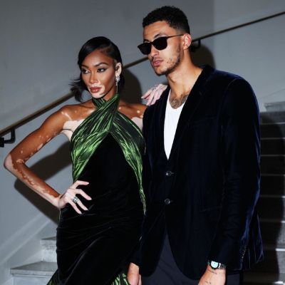 Kyle Kuzma and Winnie Harlow shared a picture wearing a color coordinated dress. 